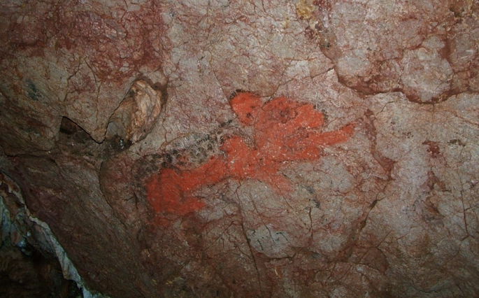 Jaguar rojo en pintura rupestre olmeca